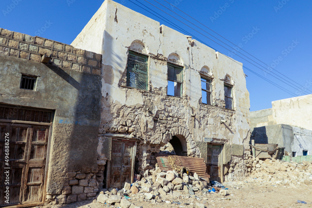 Berbera, Somaliland - November 10, 2019: Crushed Walls and Abandoned Buildings during War on the Streets of Berbera City