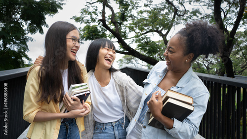 Fotografie Group of beautiful female students of various nationalities They were standing talking and laughing happily after class
