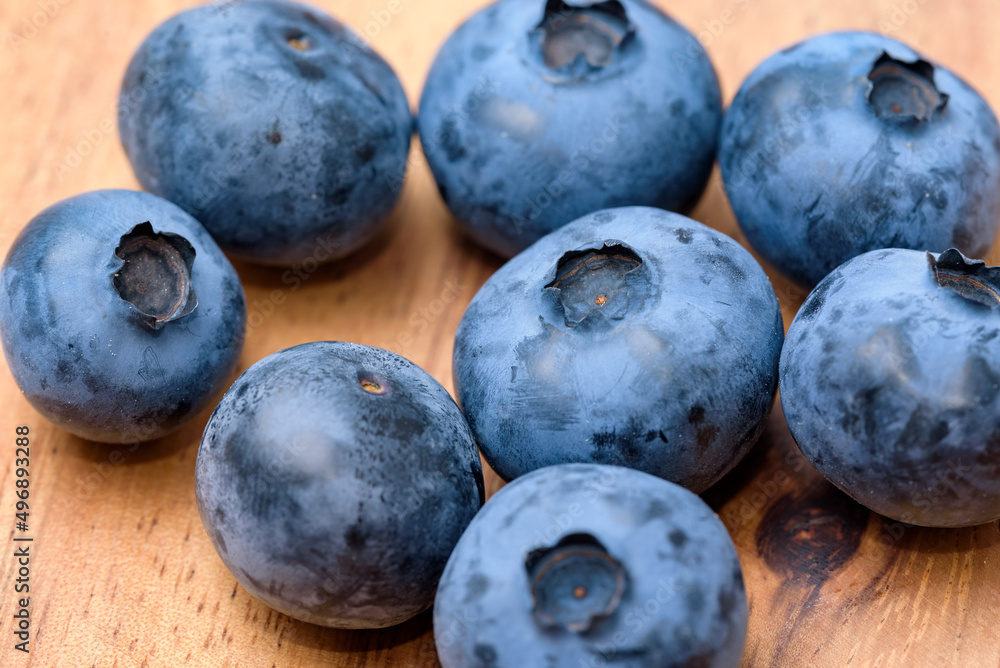 Harvested blueberry fruit (Wooden Plate Background) Harvested blueberry fruit (Wooden Plate Background)