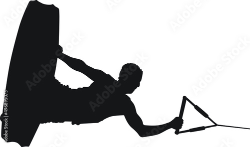 A male wakeboarder doing a trick.