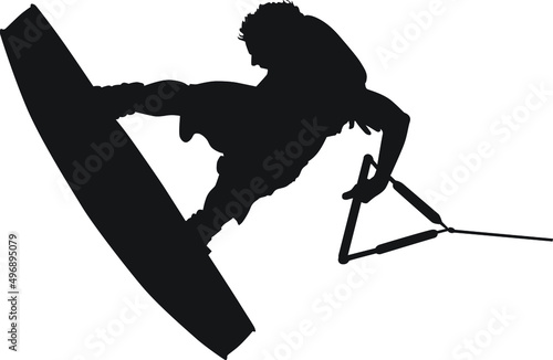 A male wakeboarder doing a trick.
