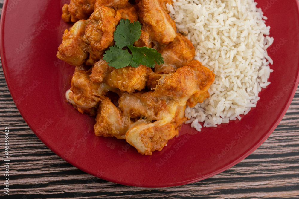 Meal - Chicken breast with pieces of mozzarella cheese and white rice Meal - Chicken breast with pieces of mozzarella cheese and white rice