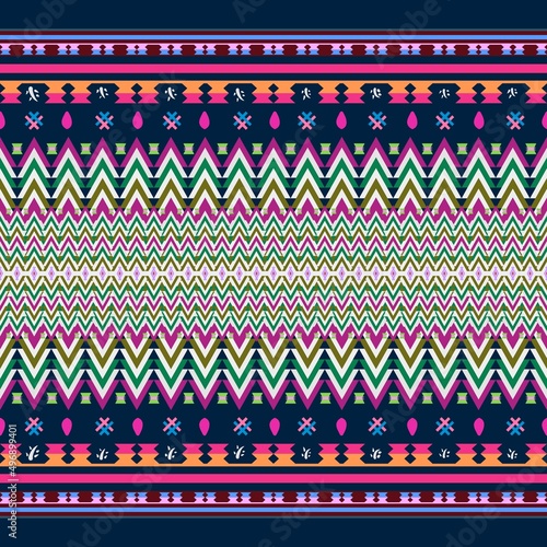 Ikat geometric folklore ornament. Tribal ethnic texture. Seamless striped pattern in Aztec style. Figure tribal embroidery. Indian, Scandinavian, Gyp sy, Mexican, folk pattern.ikat pattern. 