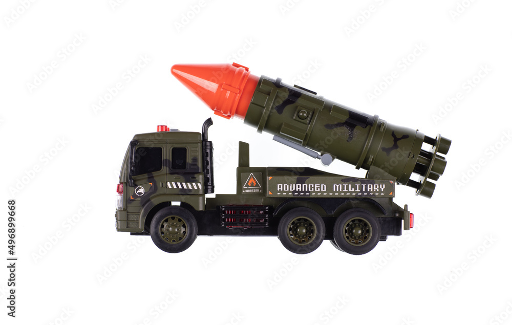 toy military vehicle with rocket isolated on white background