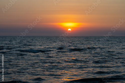 Beautiful sunset beach and light shining with waves breaking at Bang Saen Beach Chonburi province Thailand. © serra715