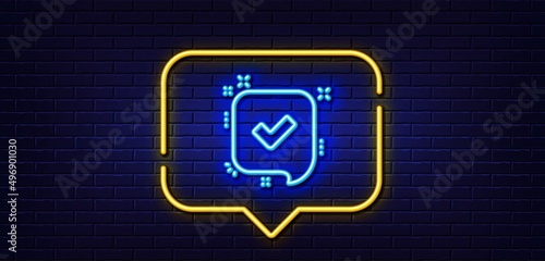 Neon light speech bubble. Approve line icon. Accepted or confirmed sign. Speech bubble symbol. Neon light background. Confirmed glow line. Brick wall banner. Vector