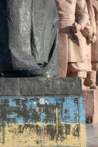 Plinth of the monument painted in Ukrainian national colors. 