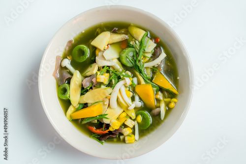 Isan bamboo shoot curry with zucchini  pumpkin  basil leaves  pickled fish  Isan Thai food 