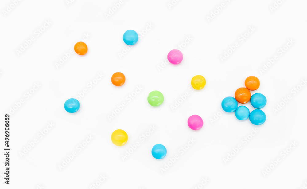 Tasty colorful candies design on white background, top view