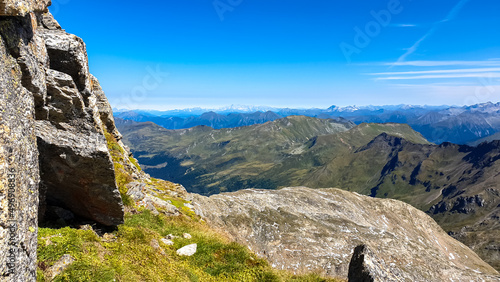 Panoramic view on the mountain ranges of the High Tauern Alps in Carinthia, Salzburg, Austria, Europe. Goldberg group in the Hohe Tauern National Park on a sunny day. Rock formation. Hiking concept