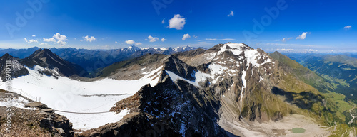 Panoramic view from Hoher Sonnblick on mountain ranges of High Tauern Alps in Carinthia, Salzburg, Austria, Europe. Goldberg group in Hohe Tauern National Park on a sunny day. View on Grossglockner © Chris