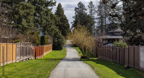 Scenic Path in a Residential Residential neighborhood in Modern City Suburbs. © edb3_16