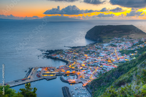 Sunset view of Velas town at Sao Jorge island in Portugal photo