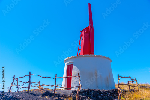 Wooden windmill at Sao Jorge island in the Azores, Portugal photo