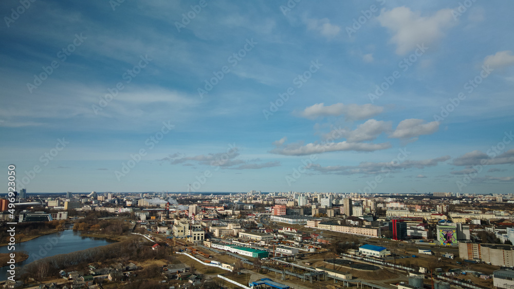 Fototapeta premium Mixed urban development. Industrial and residential area. Water city system. Aerial photography.