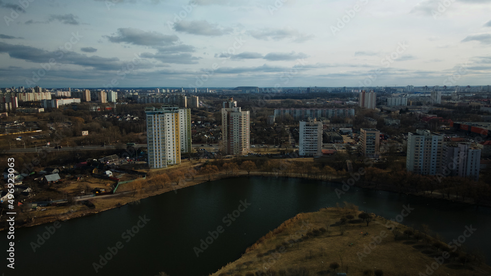 Obraz premium City block near the river. Multi-story houses. Water city system. Aerial photography.