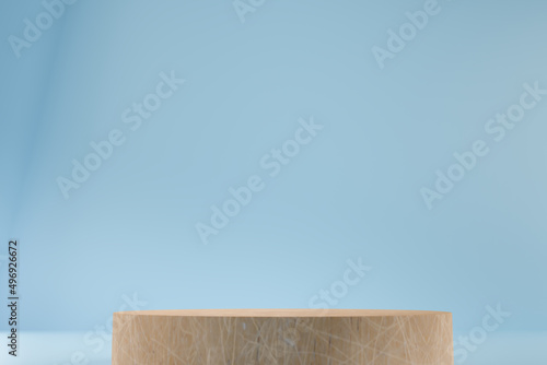 Fototapeta Naklejka Na Ścianę i Meble -  Round woodenpodium on blue background. Minimal box and geometric podium. Empty showcase for eco cosmetic product presentation