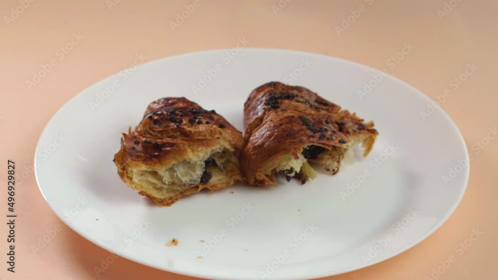 A delicious croissant on a white plate A delicious croissant on a white plate