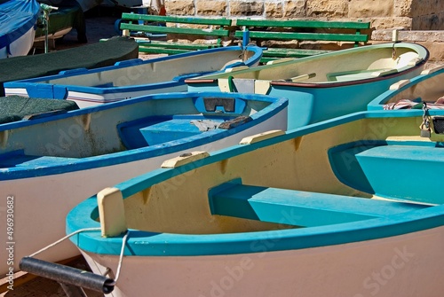 Small rowing boats for hire in a harbour on the island Malta.