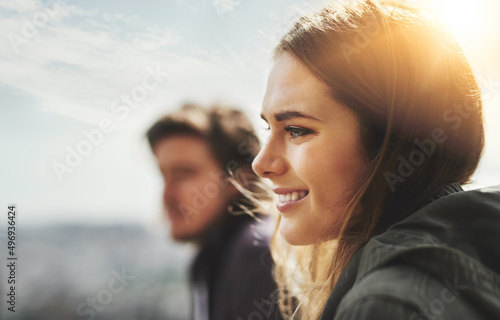 Caught in a perfect moment. Shot of two friends hanging out together outside. photo