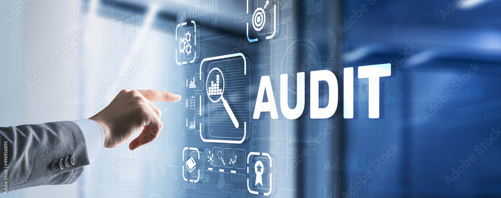 Audit. Checking the financial statements of the company. Businessman touching Audit on 3d virtual screen Audit. Checking the financial statements of the company. Businessman touching Audit on 3d virtual screen