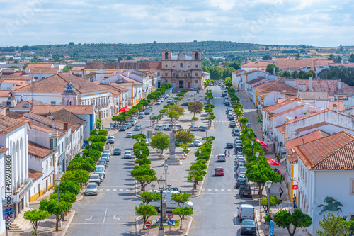 Praca de Republica leading to the Sao Bartolomeu church in Vila Vicosa, Portugal photo