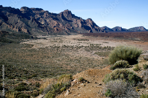 View of a plain in Teide National Park with mountains in background