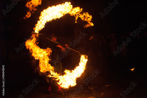 Wall of fire in front of a fire artist at a medieval market