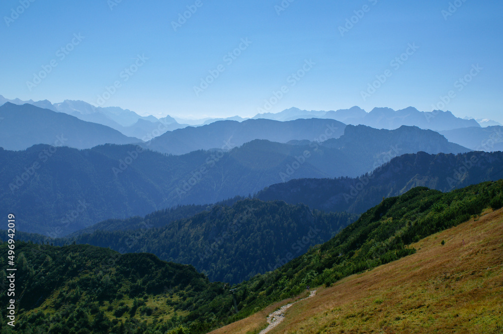 View of the Alps with wooded mountain ridge near Brauneck