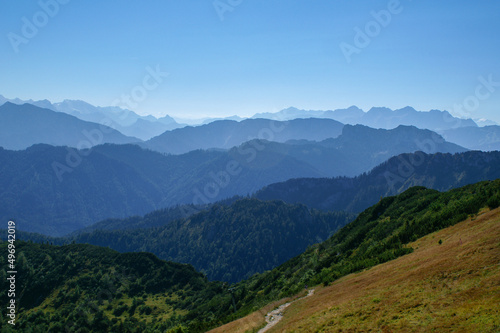 View of the Alps with wooded mountain ridge near Brauneck