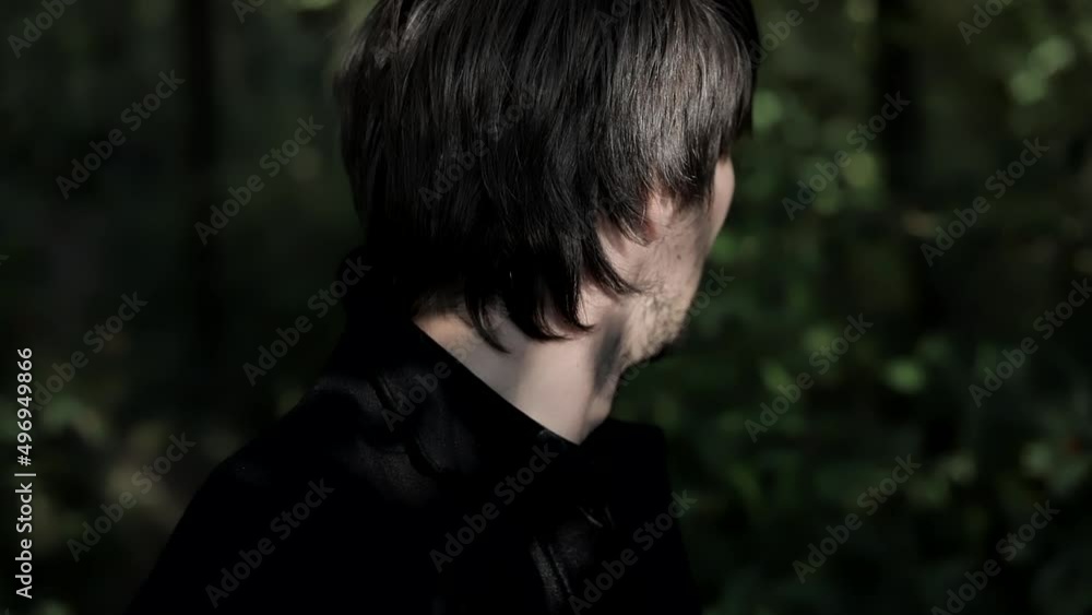 Thoughtful and excited man in black,
close-up. Nervous and worried. Depression and self-discovery. Forest and open field Thoughtful and excited man in black,
close-up. Nervous and worried. Depression and self-discovery. Forest and open field