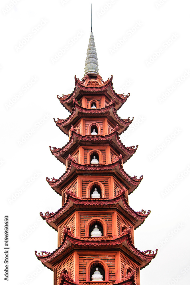 Fototapeta premium Closeup of the Beautiful Red Tower at the Buddhist Temple Tran Quoc Pagoda in Hanoi, Vietnam