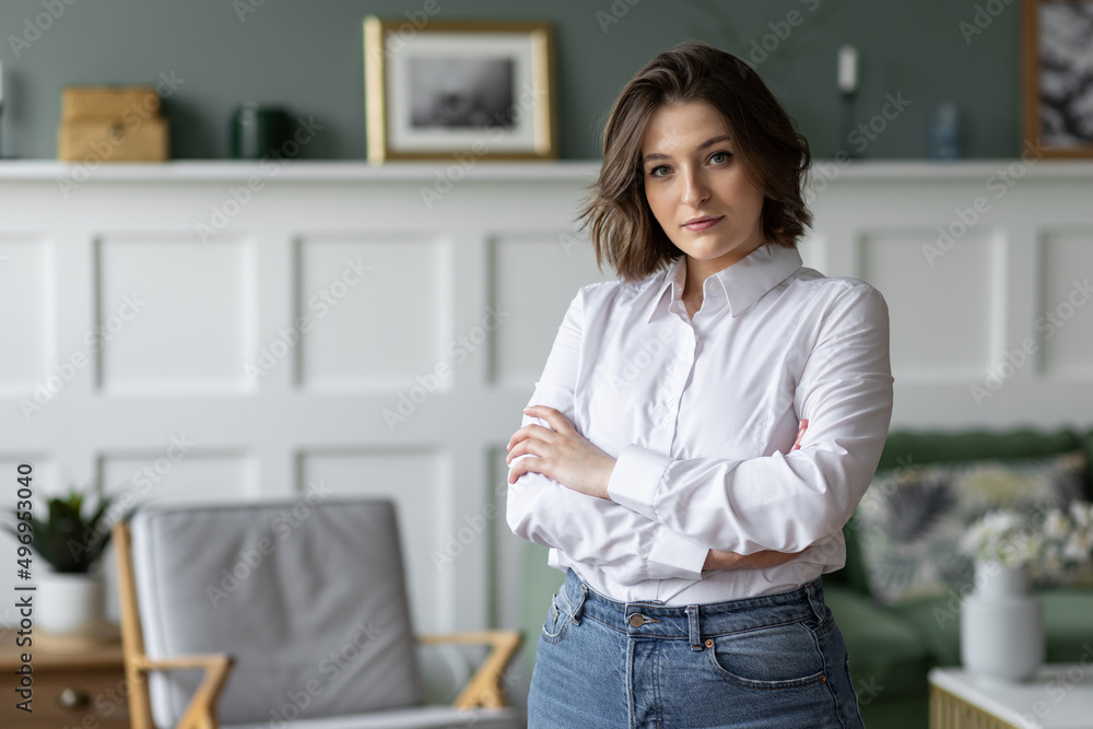 Beautiful young business woman. Concept of success, female at work, office clothes style, dress code. Professions: lawyer, advocate, entrepreneur. Self confident, smart Beautiful young business woman. Concept of success, female at work, office clothes style, dress code. Professions: lawyer, advocate, entrepreneur. Self confident, smart