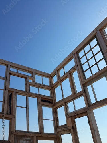 old wooden structure of windows and doors in the open air on the beach