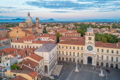 Sunrise view of Torre dell'Orologio and Cathedral of Santa Maria Assunta in Italian town Padua photo