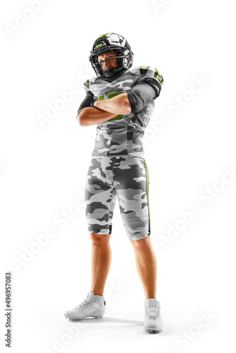 Fototapeta Naklejka Na Ścianę i Meble -  Brutal an American football player stands in white background. Arms-standing. Sports emotions