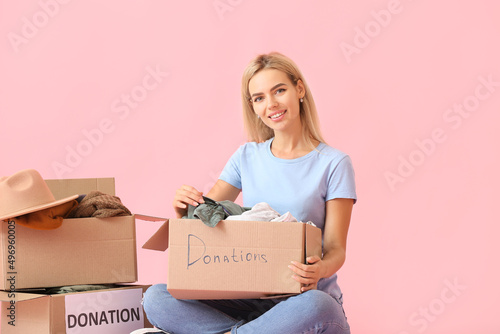Young woman and boxes with ...