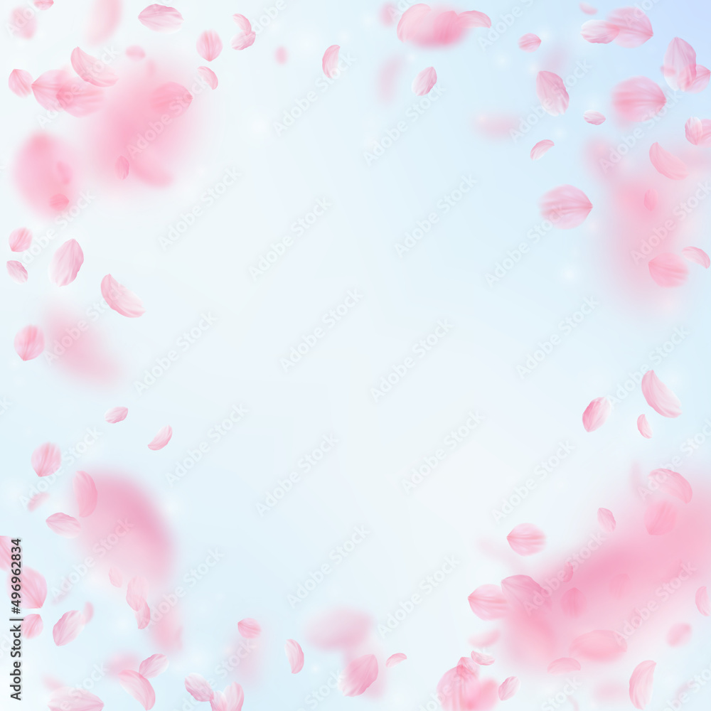 Sakura petals falling down. Romantic pink flowers vignette. Flying petals on blue sky square background. Love, romance concept. Exquisite wedding invitation. Sakura petals falling down. Romantic pink flowers vignette. Flying petals on blue sky square background. Love, romance concept. Exquisite wedding invitation.