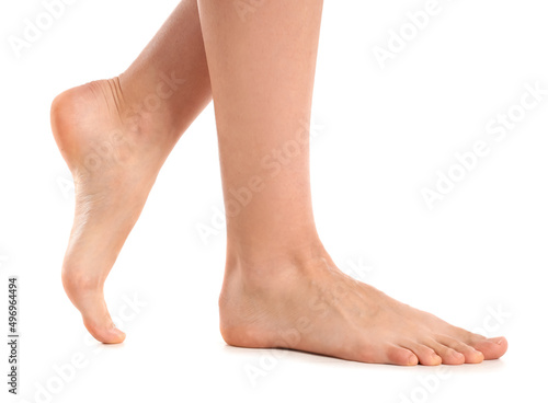 Fototapeta Naklejka Na Ścianę i Meble -  Female bare feet on white background, closeup