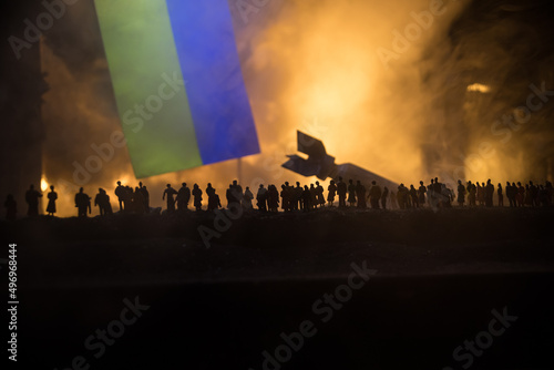 Creative artwork decoration war on Ukraine. Crowd looking on giant explosion and attacking soldiers.