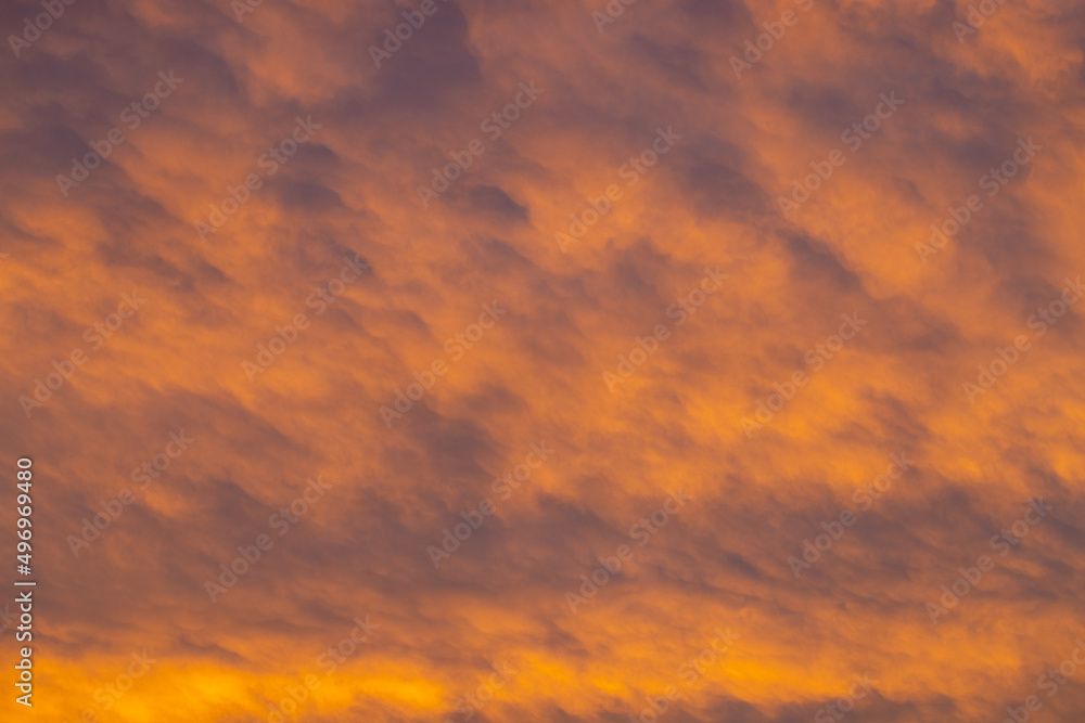 Orange clouds at late afternoon sunset Orange clouds at late afternoon sunset