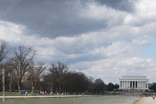 Lincoln Memorial, Reflection Pool, Pedestrians, Clouds and Sky on Spring Day in Wathington DC