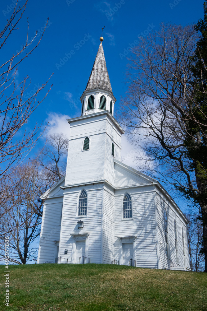 Warwick, NY - USA - April 2, 2022: Vertical view of the historic Old School Baptist Meeting house ilocated in the village of Warwick.