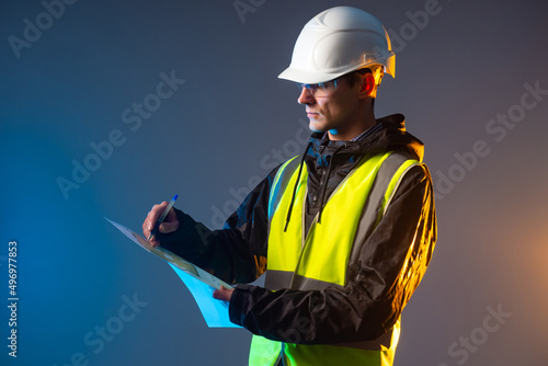 Builder draws blueprints. C...