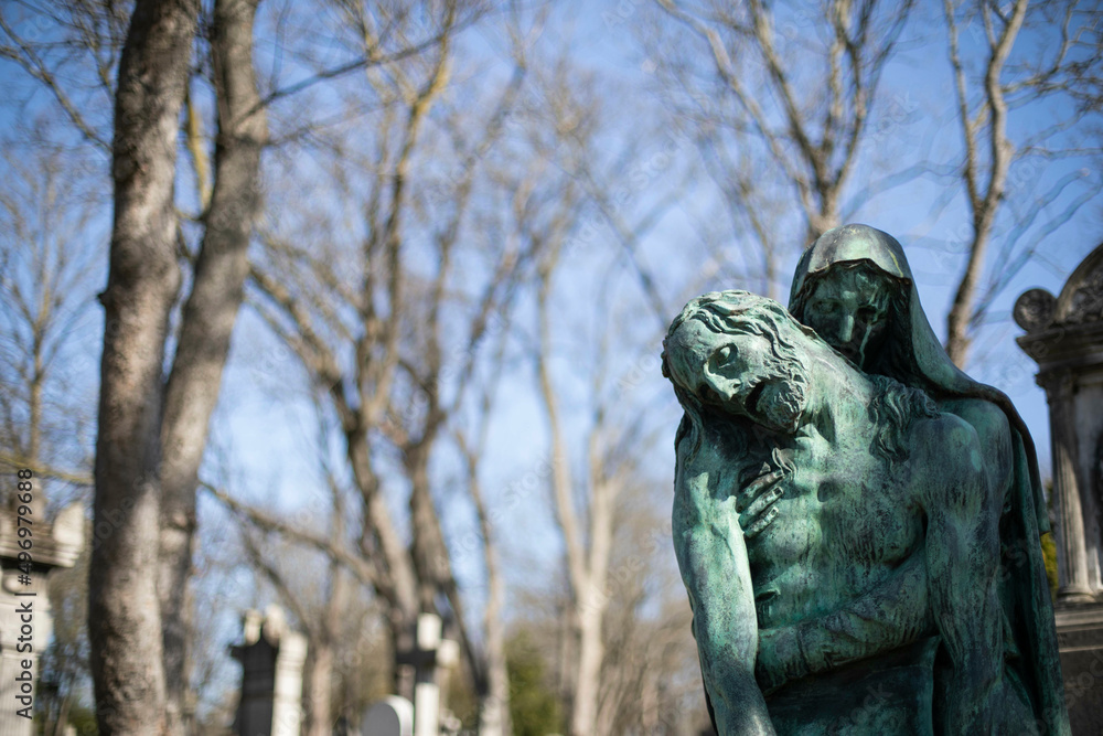 Statue of Mary holding Jesus at Pere Lachaise Cemetery Statue of Mary holding Jesus at Pere Lachaise Cemetery