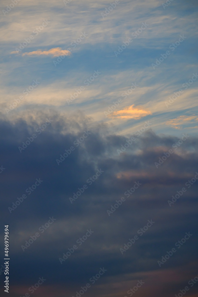 Landscape fantastic Sunset or sunrise with rays of light through the sky. Beautiful white clouds and blue sky high definition skyscraper with grunge texture for background Abstract,nature art style,