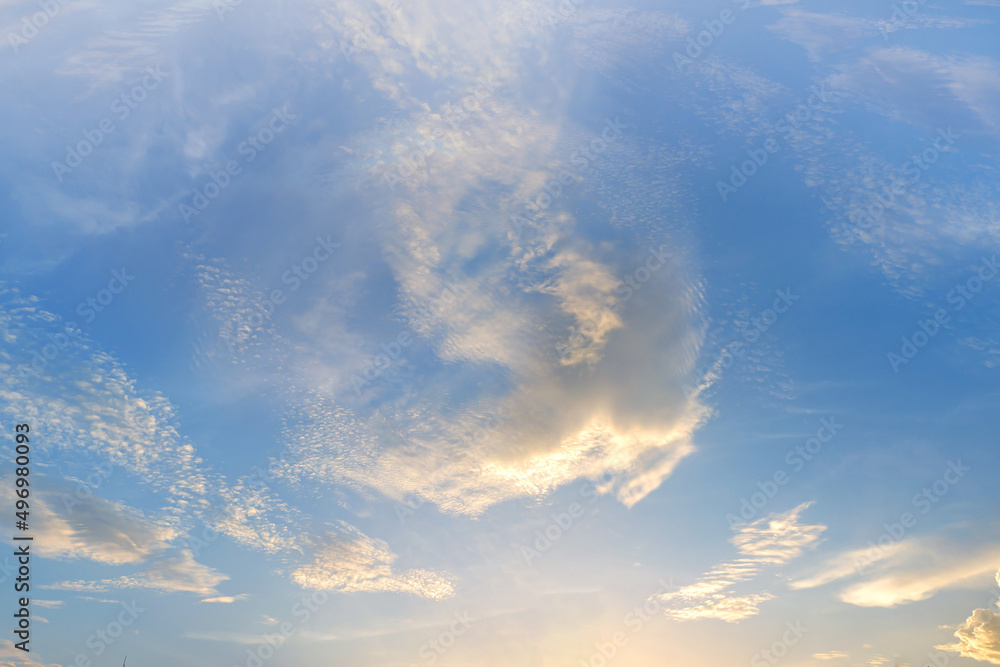 Obraz premium Landscape fantastic Sunset or sunrise with rays of light through the sky. Beautiful white clouds and blue sky high definition skyscraper with grunge texture for background Abstract,nature art style,