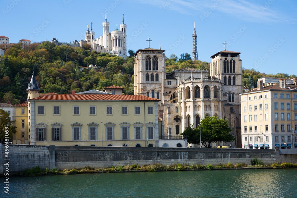 View from Saone river of Fourviere hill with Cathedral and Notre-Dame de Fourviere Basilica, Lyon, France