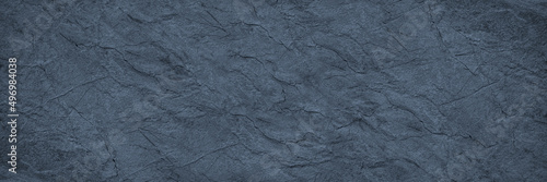 Panel kuchenny z motywem Blue gray stone texture. Toned rough rock surface. Close-up. Grunge background with copy space for design. Wide banner. Panoramic.