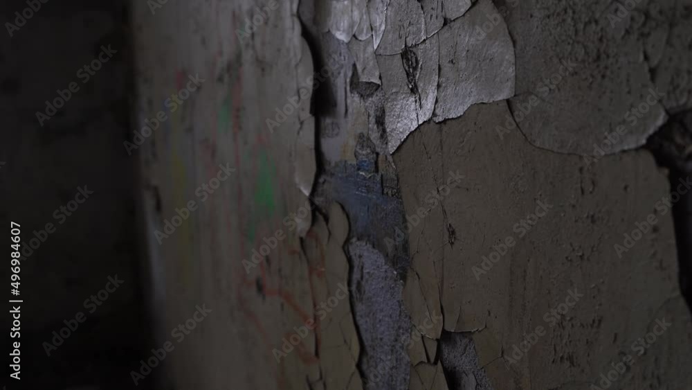 old peeling wall in a ruined building. abandoned house old peeling wall in a ruined building. abandoned house